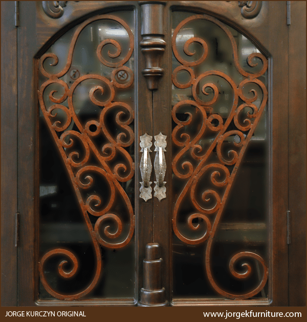Close-up of oxidized, hand forged ironwork on Martina 2 armoire