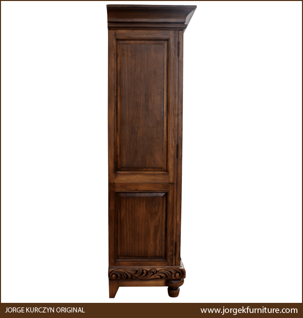 Side view of Spanish Colonial Armoire showing solid wood construction and rounded base