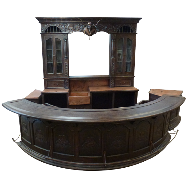 Elevated front view of wood bar with curved top and carved details