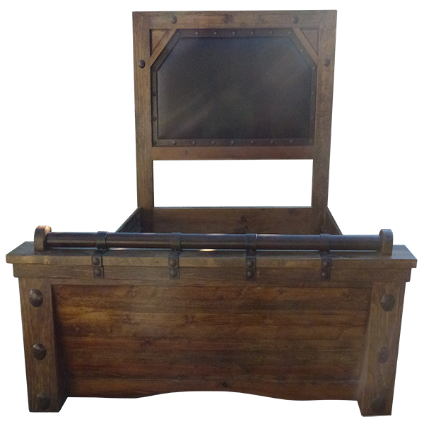 Front view of Western-style bed with iron conchos and brown leather panel