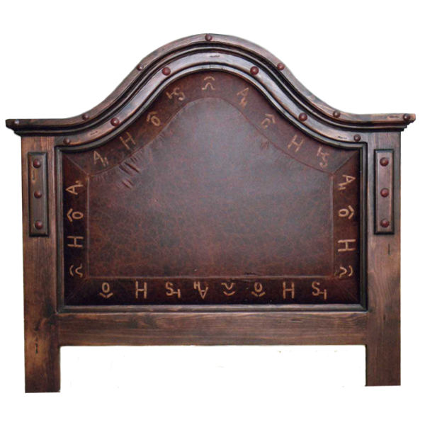 Front view of Western-style headboard with branded leather and forged iron nail accents