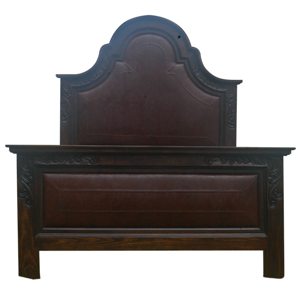Front view of Western-style bed with tooled leather and arched headboard