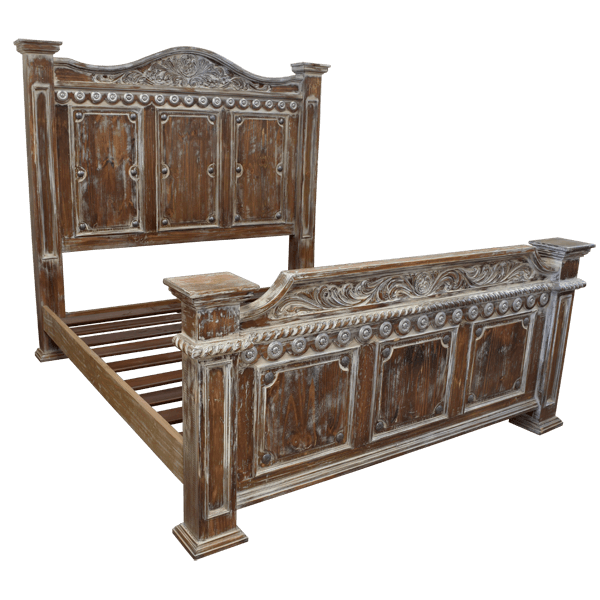 Semi-front view of rustic Western-style bed with whitewashed wood and silver copper conchos