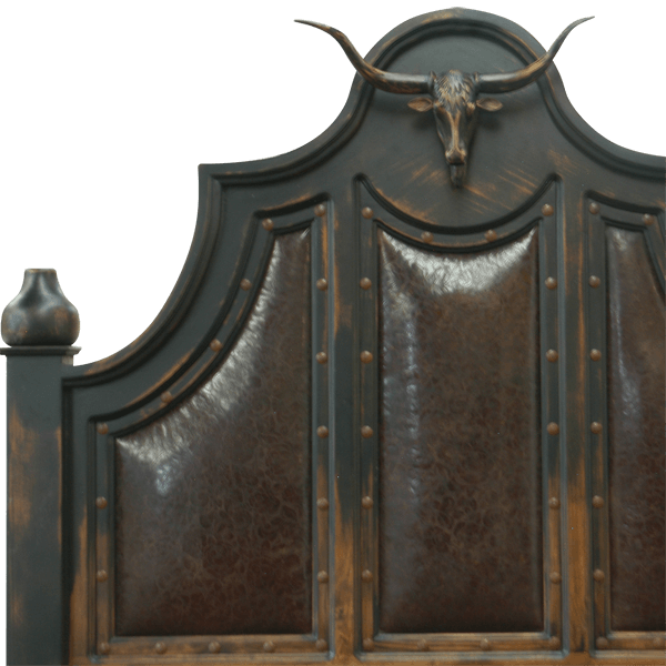 Detail of hand carved bull head crest with twist rope and scroll ornamentation