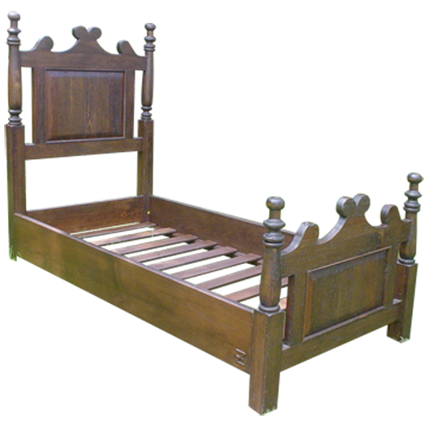 Semi-front view of Spanish colonial bed with crested headboard and rectangular panel
