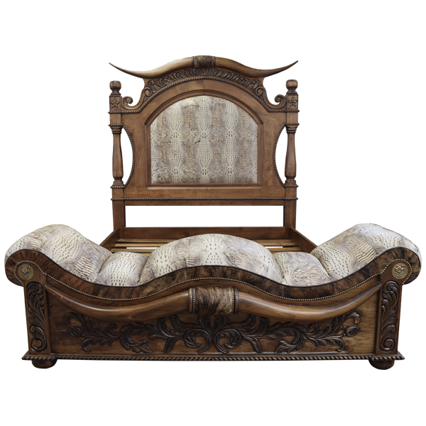 Front view of Western-style bed with carved horns, crocodile pattern leather, and copper accents