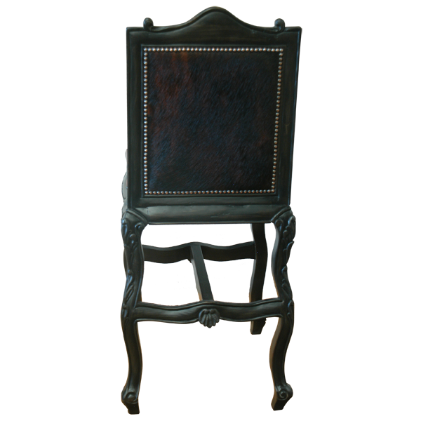 Rear view of Conquistador II bar stool with darker cowhide and carved crest