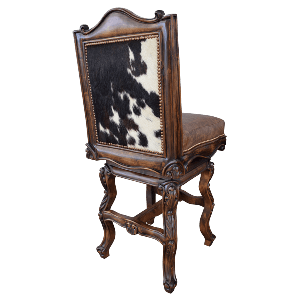 Rear three-quarter view of El Picador 7 chair with cowhide back panel and carved wood