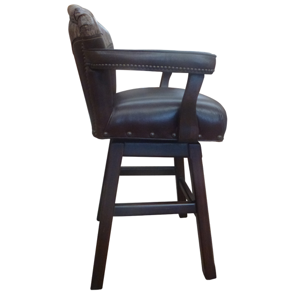 Side view of Cowboy 6 bar stool with embossed leather armrest and dark wood frame