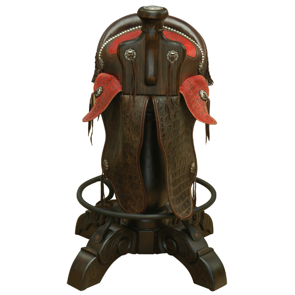 Front view of Kineño Saddle bar stool with patterned leather seat and floral horn medallion