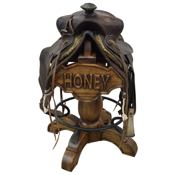 Front view of Champion 4 Saddle bar stool with carved wood and Western copper panels